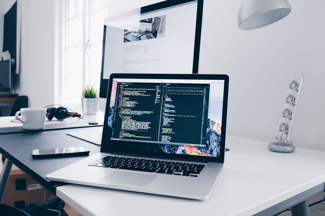 Building your own website with Claude AI on a laptop code editor